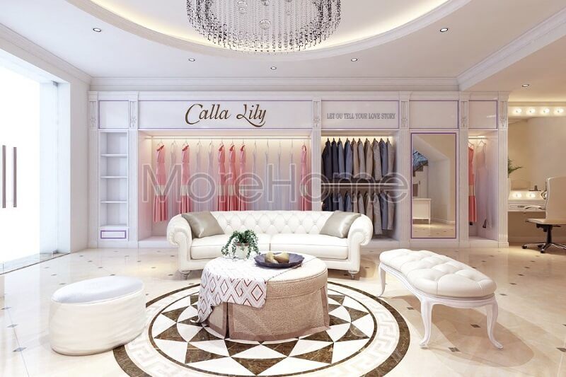 Mẫu thiết kế nội thất showroom áo cưới được trang bị tinh tế bằng hệ tủ gỗ màu trắng cao cấp, tạo nên sự hài hòa trong không gian màu trắng sang trọng.